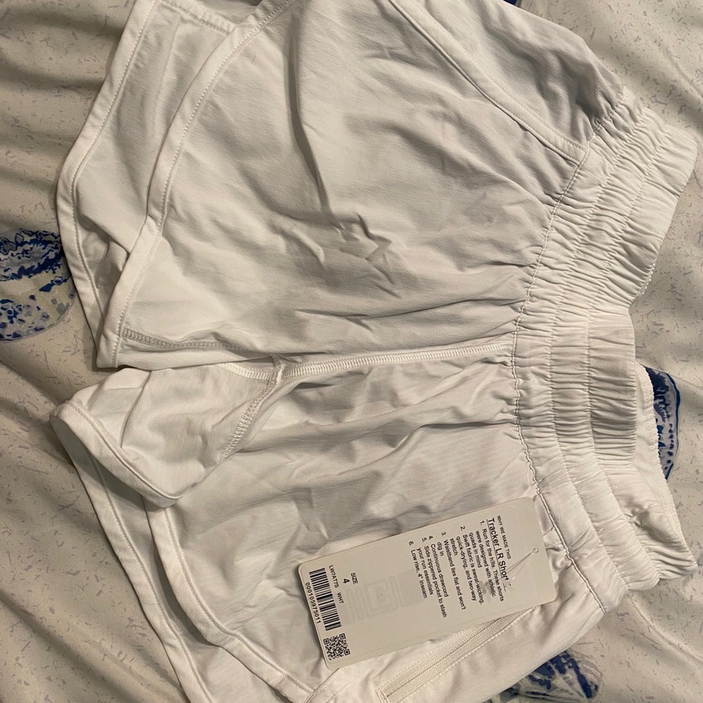 white lululemon tracker shorts